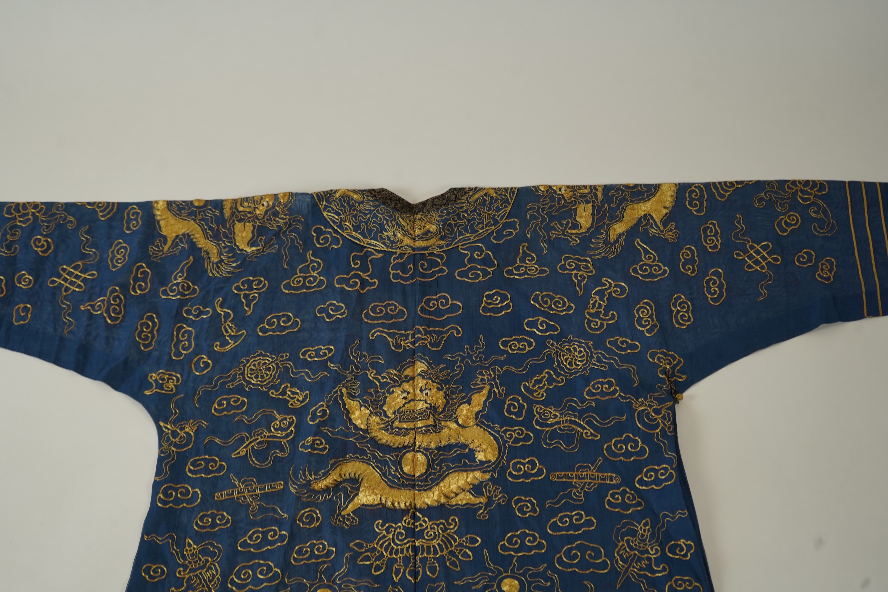 A Chinese gold thread and silk gauze ‘dragon’ summer robe, jifu, early 20th century